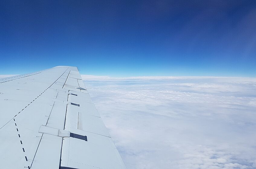 Above the clouds.