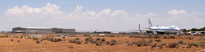 Aircraft hangar on the left, B747 shuttle carrier aircraft on the right