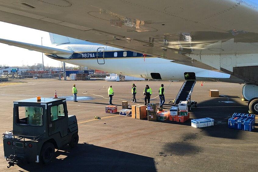 Loading equipment for the second part of the first ATom deployment onto the DC-8