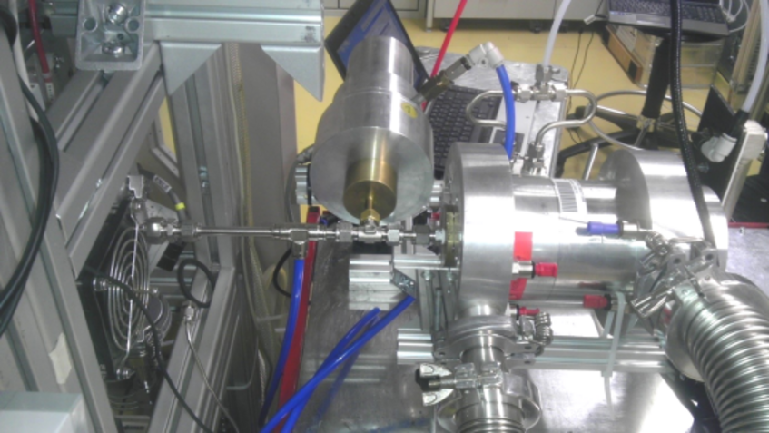 Fig. 4 The Vienna UDMA connected to the Frankfurt CI-APi-TOF-MS (Chemical Ionization Atmospheric Pressure interface Time-Of-Flight Mass Spectrometer) during a measurement campaign in March 2015. The UDMA was used as supply of ionic calibration clusters of